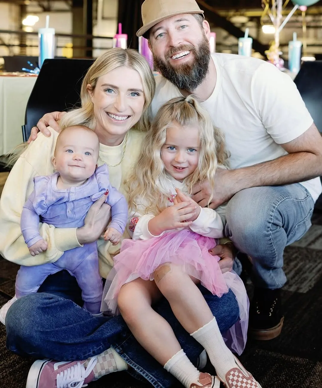 Brett Roth with his wife and children