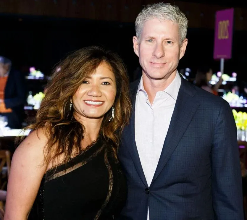 Chris Larsen wih his wife