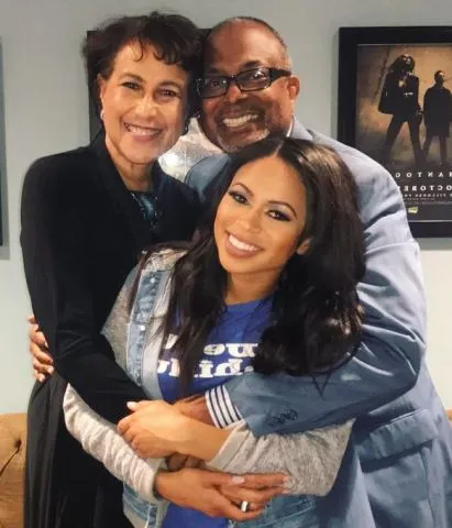 Alex Holley with her parents